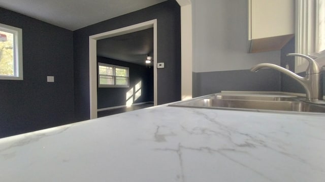 interior space featuring light countertops and a sink