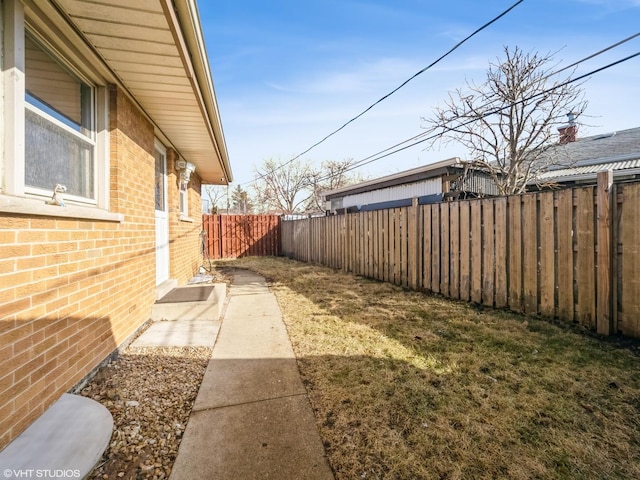 view of yard featuring a fenced backyard