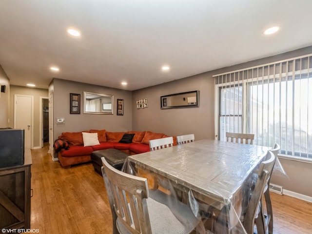 dining area featuring light wood-type flooring, visible vents, a wealth of natural light, and recessed lighting