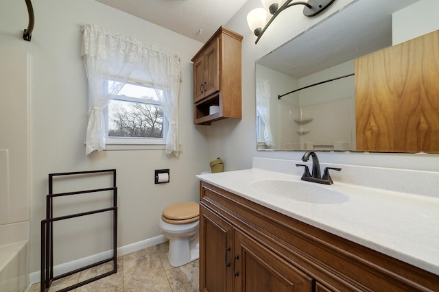 bathroom with a tub to relax in, baseboards, toilet, walk in shower, and vanity