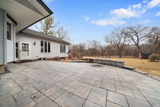 view of patio featuring a fire pit