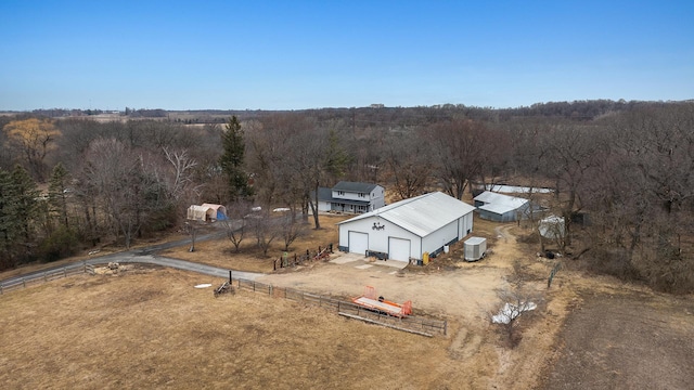 drone / aerial view with a view of trees