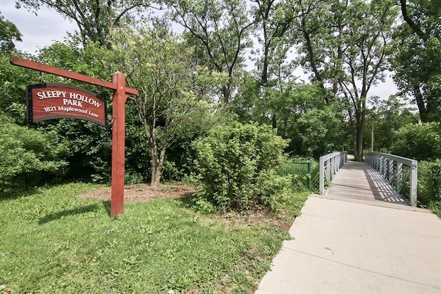 view of home's community featuring a yard