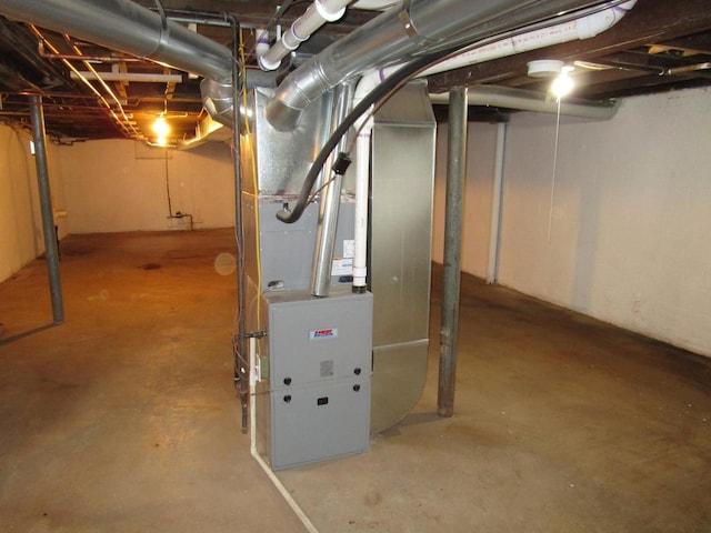 unfinished basement with heating unit