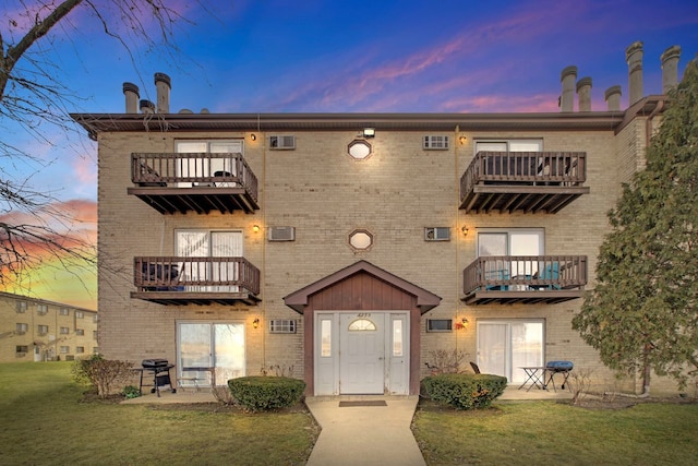 view of property at dusk