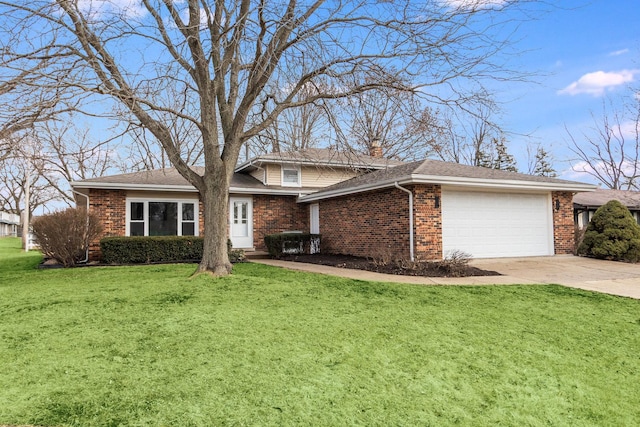 view of front of property featuring an attached garage, a front yard, and brick siding