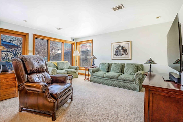 carpeted living room with visible vents