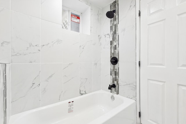 bathroom featuring  shower combination