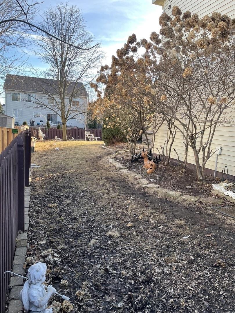 view of yard with fence