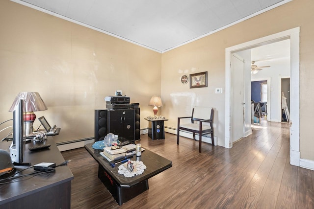 living room with a ceiling fan, wood finished floors, baseboard heating, and ornamental molding