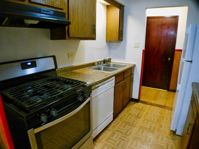 15805 Peggy Ln Unit 2, Oak Forest, IL 60452 - kitchen with white appliances, brown cabinetry, a sink, and under cabinet range hood