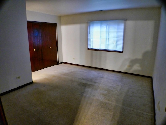 15805 Peggy Ln Unit 2, Oak Forest, IL 60452 - unfurnished bedroom featuring a closet, carpet, and baseboards