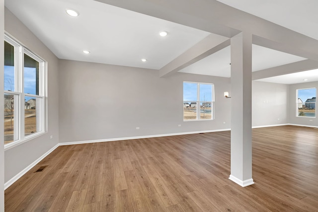 733 Juniper St, Oswego, IL 60543 - unfurnished living room with wood finished floors and recessed lighting
