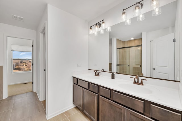 733 Juniper St, Oswego, IL 60543 - bathroom with double vanity and a stall shower