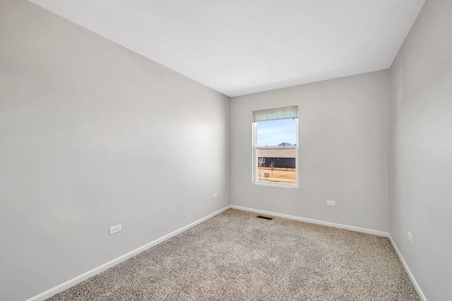 733 Juniper St, Oswego, IL 60543 - spare room featuring light carpet