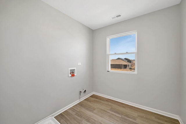 733 Juniper St, Oswego, IL 60543 - washroom featuring hookup for a washing machine, light wood-style flooring, and gas dryer hookup