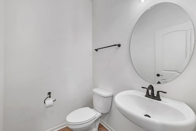 733 Juniper St, Oswego, IL 60543 - half bath featuring a sink and toilet