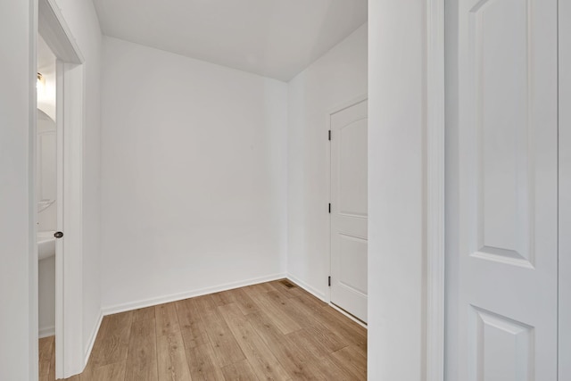 733 Juniper St, Oswego, IL 60543 - empty room featuring light wood-style floors and baseboards