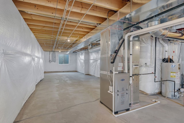 733 Juniper St, Oswego, IL 60543 - below grade area with gas water heater, electric panel, and heating unit