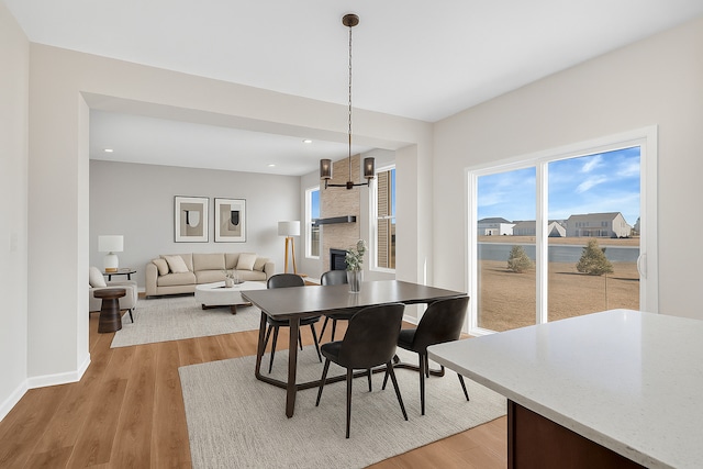 733 Juniper St, Oswego, IL 60543 - dining room with light wood-type flooring and recessed lighting
