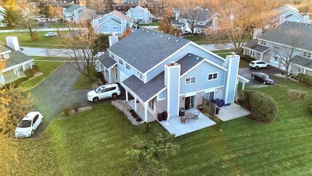 drone / aerial view featuring a residential view