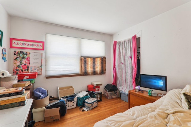 bedroom featuring wood finished floors