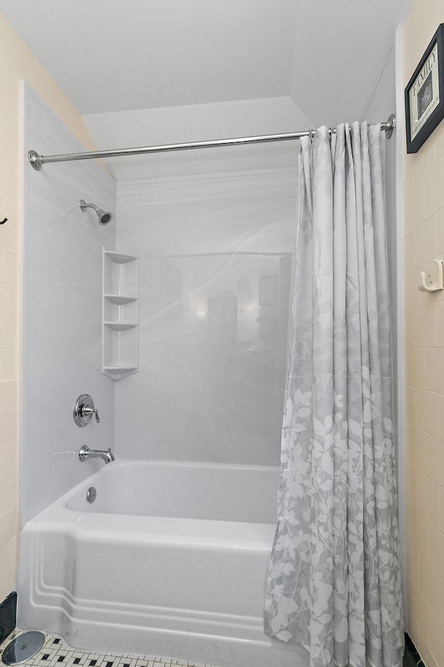 bathroom featuring shower / bath combination with curtain