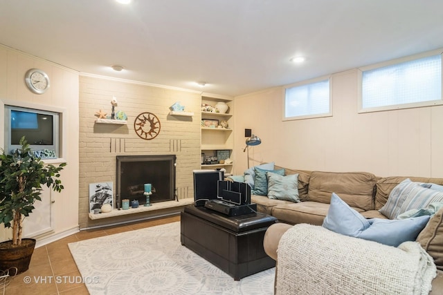 living room featuring a fireplace, tile patterned flooring, and built in features