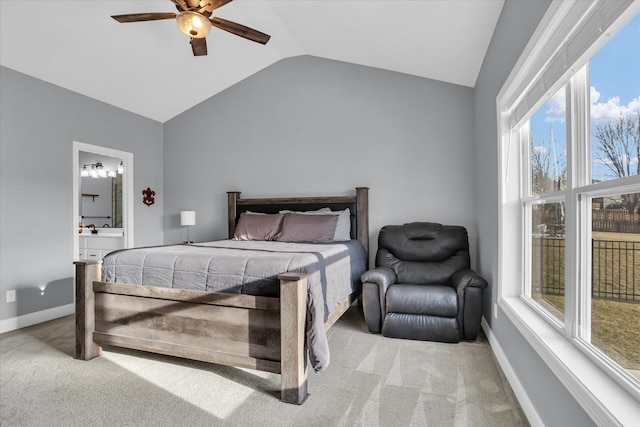 bedroom with baseboards, carpet floors, and vaulted ceiling