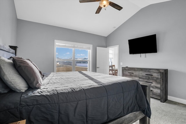 bedroom with vaulted ceiling, a ceiling fan, baseboards, and light carpet