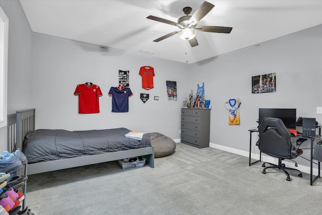 bedroom featuring carpet flooring, baseboards, and ceiling fan