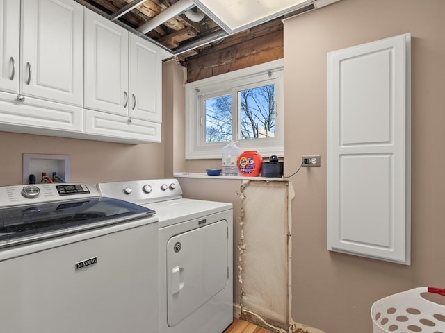 laundry area with cabinet space and washer and dryer