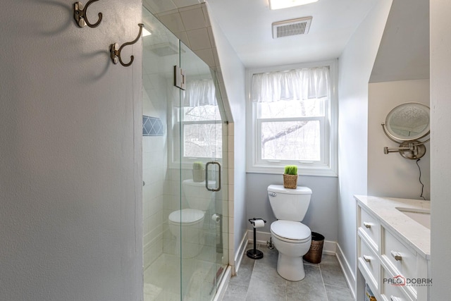 full bath featuring a stall shower, baseboards, visible vents, toilet, and vanity