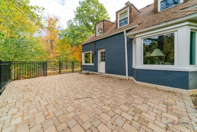 view of patio with fence