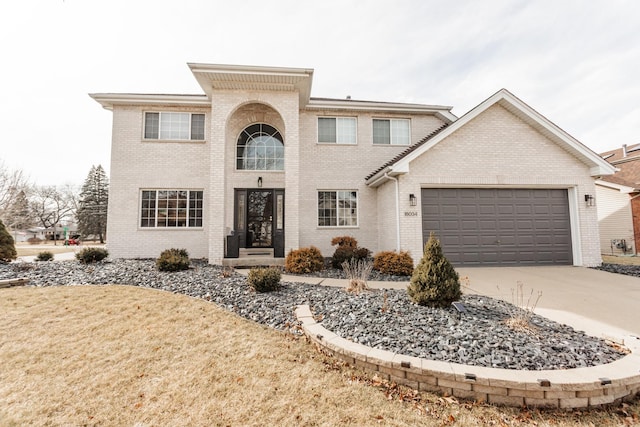 view of front facade featuring driveway, a garage, and brick siding