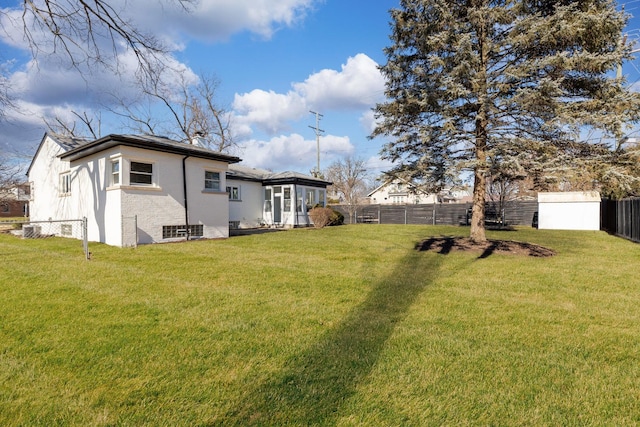 view of yard featuring fence