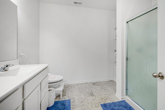 bathroom with visible vents, toilet, a stall shower, vanity, and baseboards