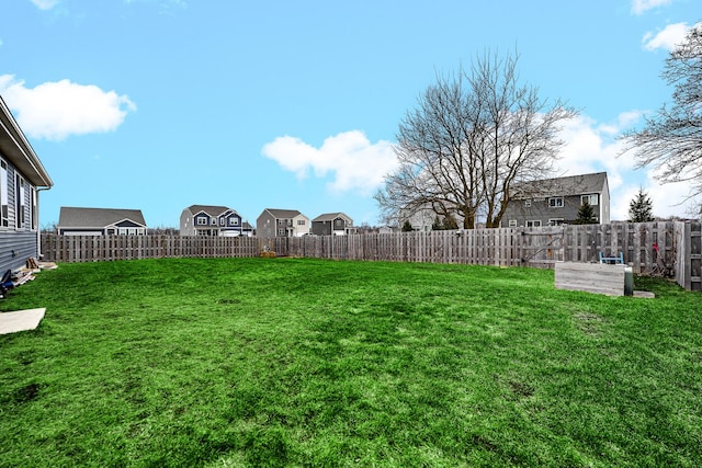 view of yard featuring a fenced backyard