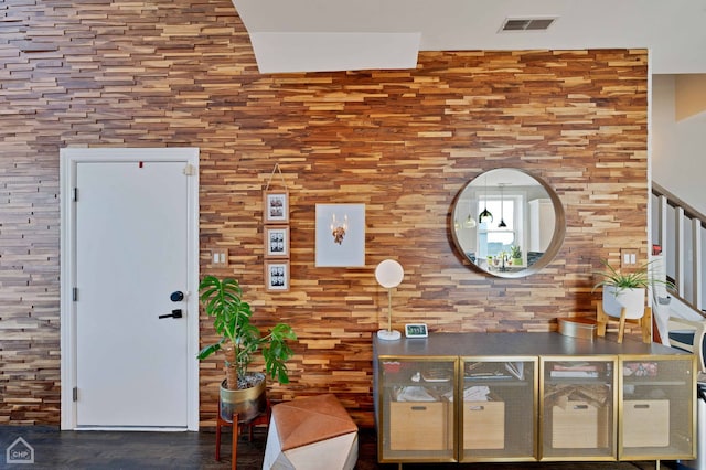 interior space featuring visible vents and wood finished floors