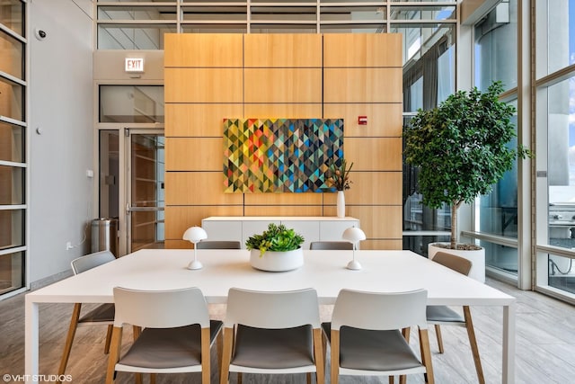 dining area with floor to ceiling windows