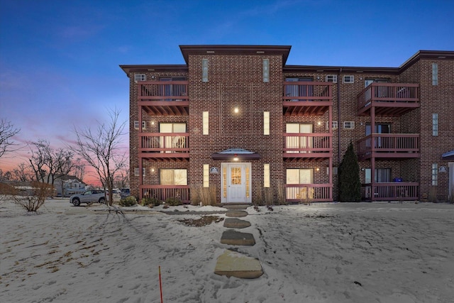 view of property at dusk