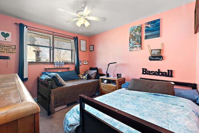 carpeted bedroom featuring a ceiling fan