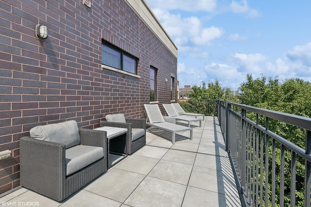 view of patio with a balcony