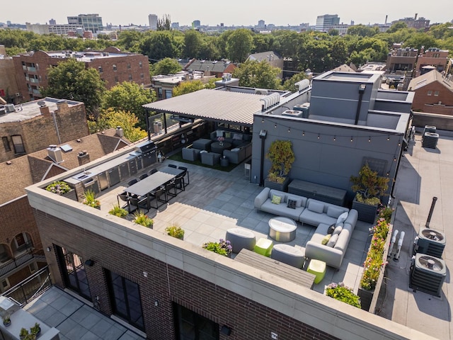 drone / aerial view featuring a city view