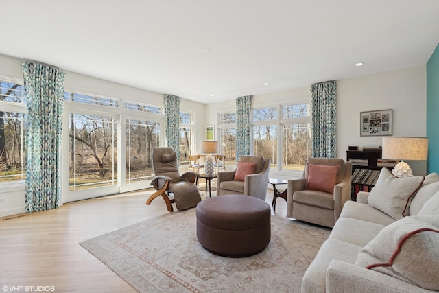 living area featuring recessed lighting and wood finished floors