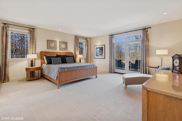 bedroom featuring recessed lighting, access to outside, baseboards, and light colored carpet