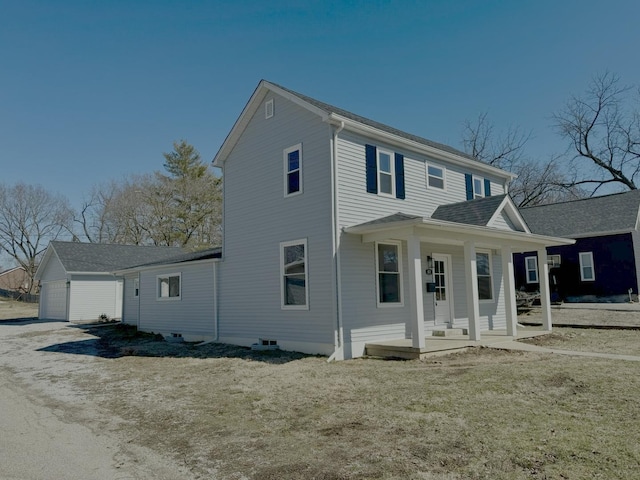 view of front of property featuring covered porch and a garage