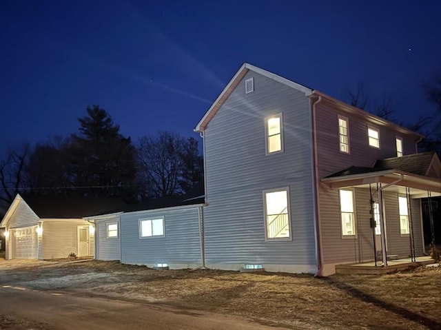 view of property exterior at twilight