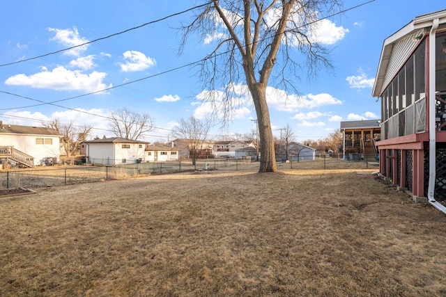 view of yard with fence and a residential view