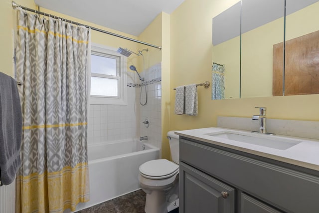 full bathroom featuring shower / tub combo, vanity, and toilet